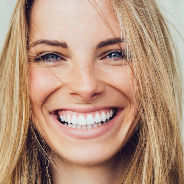 closeup of blonde woman smiling